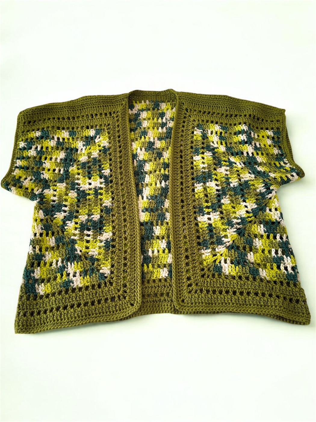 Green cropped crochet jacket