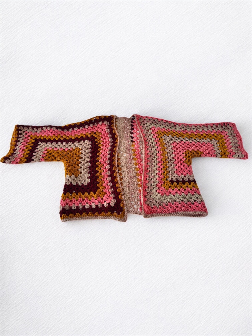 Colourful granny-square crochet jacket